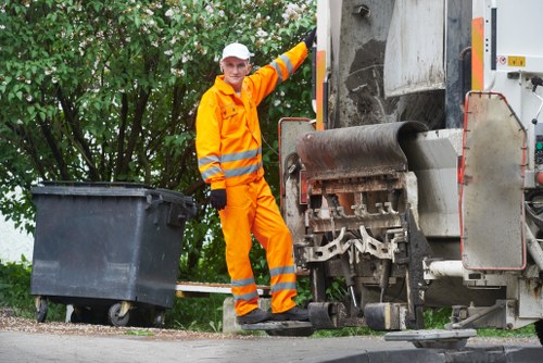 Technician explaining accessibility measures during yard clearance